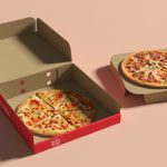 Double-decker pizza box showcasing two pizzas with a smart separator pad, designed for cost-effective and eco-friendly pizza delivery.